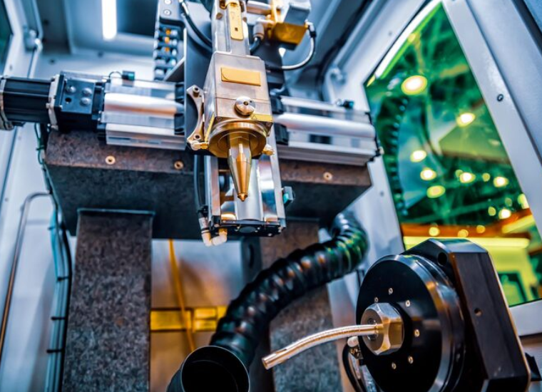 Cnc laser cutting of metal, modern industrial technology. Small depth of field.